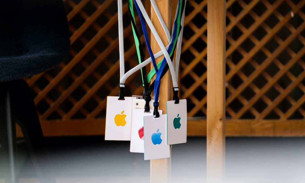 ID tags with the Apple logo in multiple colors on lanyards